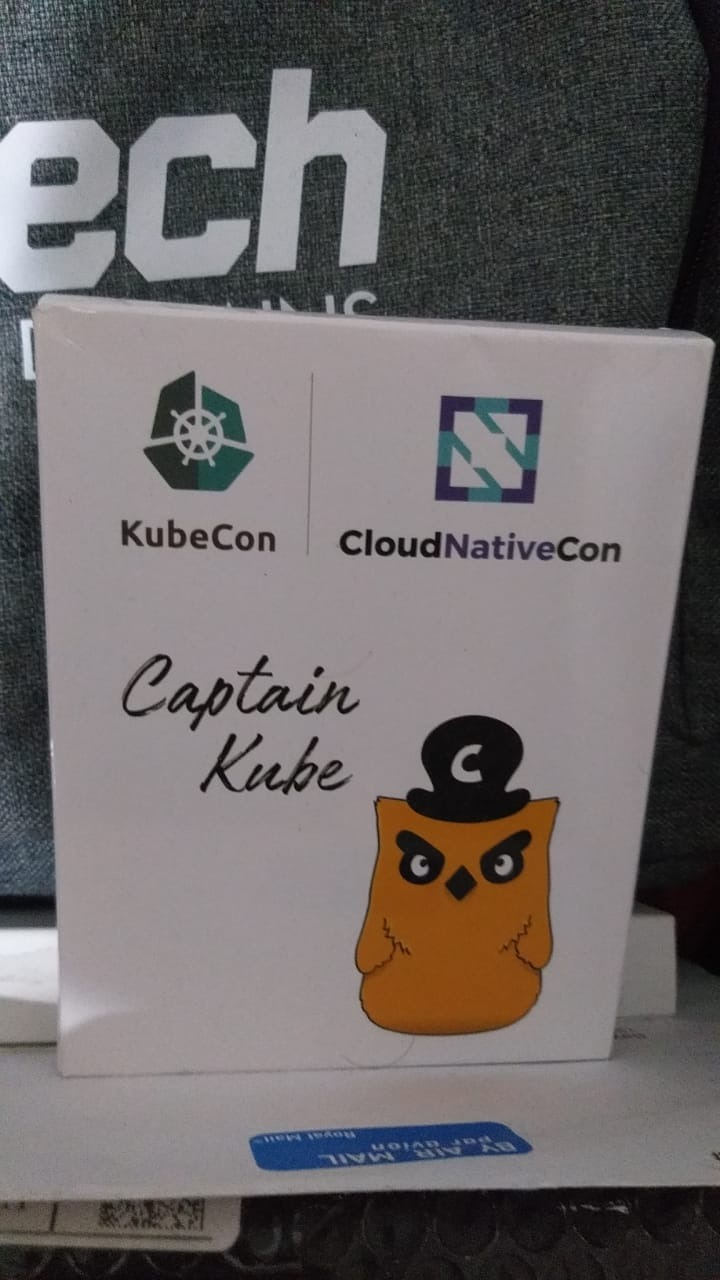 Package with KubeCon, CloudNativeCon and Captain Kube in cover 