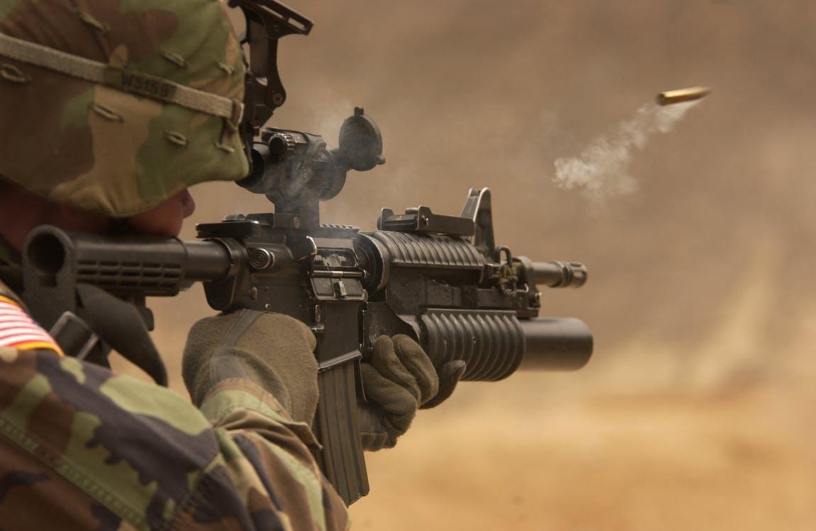 Free Soldier Holding Rifle Stock Photo