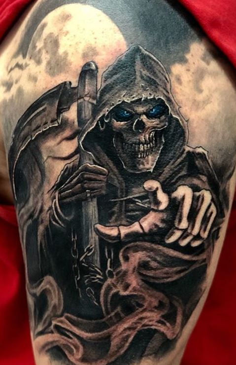 Close up view of the evil grim reaper tatoo