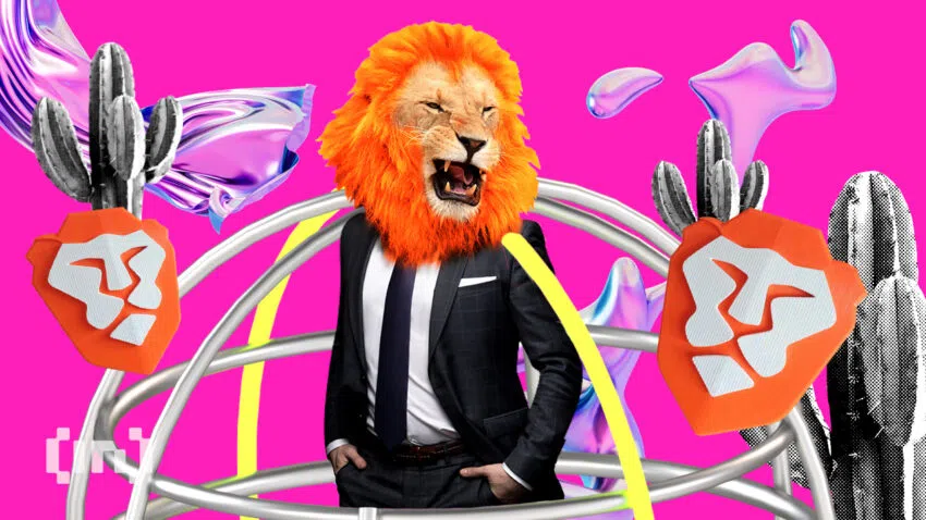 Man sieht einen Mann im Anzug mit einem Löwenkopf umgeben von BAT (Brave Browser Token) Logos. Das ganze Design ist pink und abstrakt gehalten, mit Kakteen als Dekoration - Ein Bild von BeInCrypto.com.