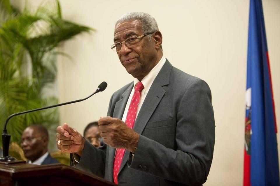 The president of Haiti’s election verification commission, Francois Benoit, speaks during a ceremony in the national palace in Port-au-Prince on Monday, May 30, 2016.