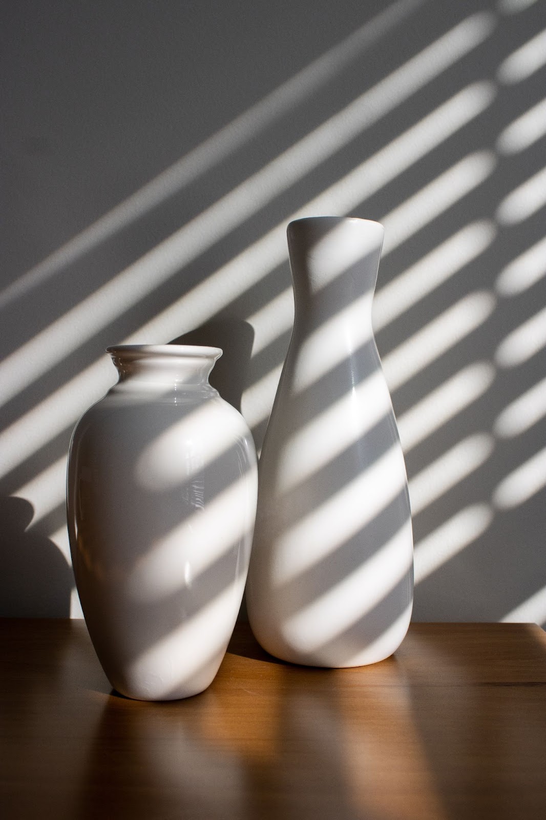 White vases in the shadows