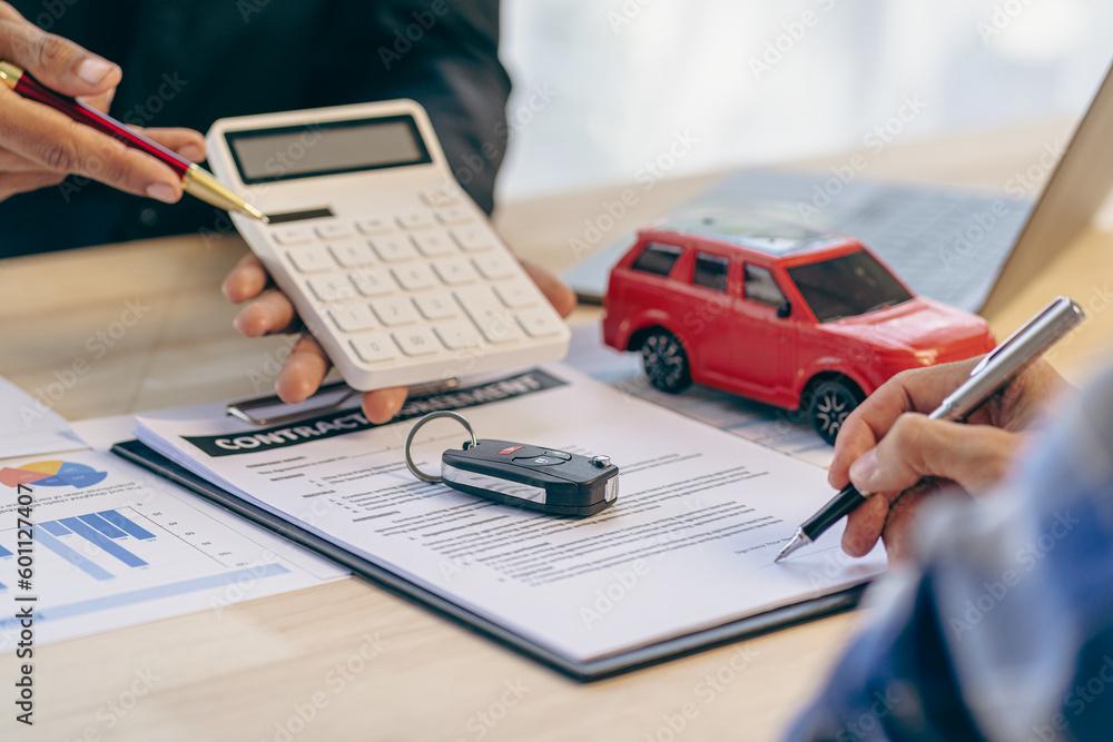 Car dealerships and customers sign car insurance documents or rental paper. Planning to manage transportation finance costs The concept of car insurance and new car loan business