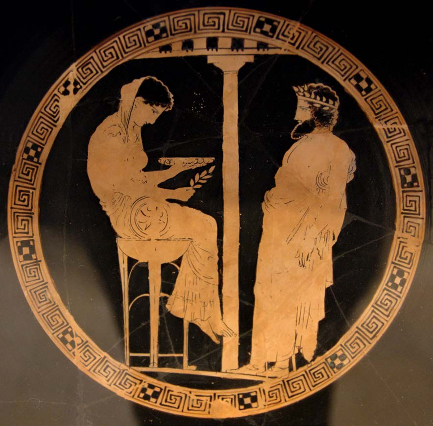 Themis and Aegeus | The Pythia seated on the tripod and holding a laurel branch– symbols of Apollo, who was the source of her prophecies. This is the only surviving image of the Pythia from ancient Greece | Author: User “Bibi Saint-Poi” | Source: Wikimedia Commons | License: Public Domain