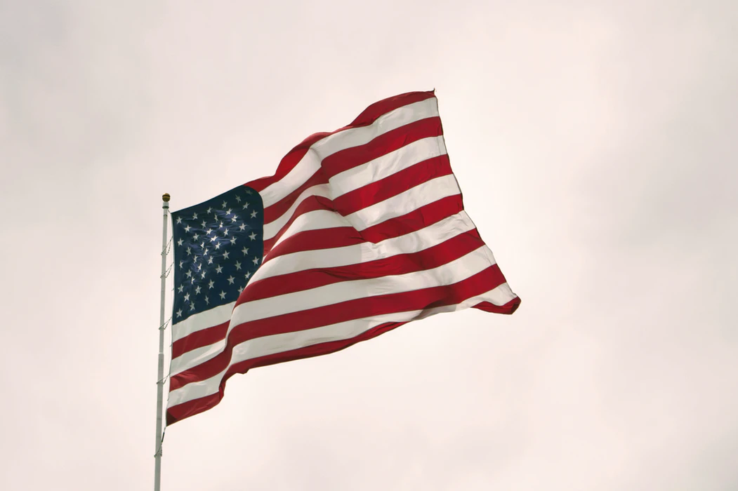 US flag waving on pole