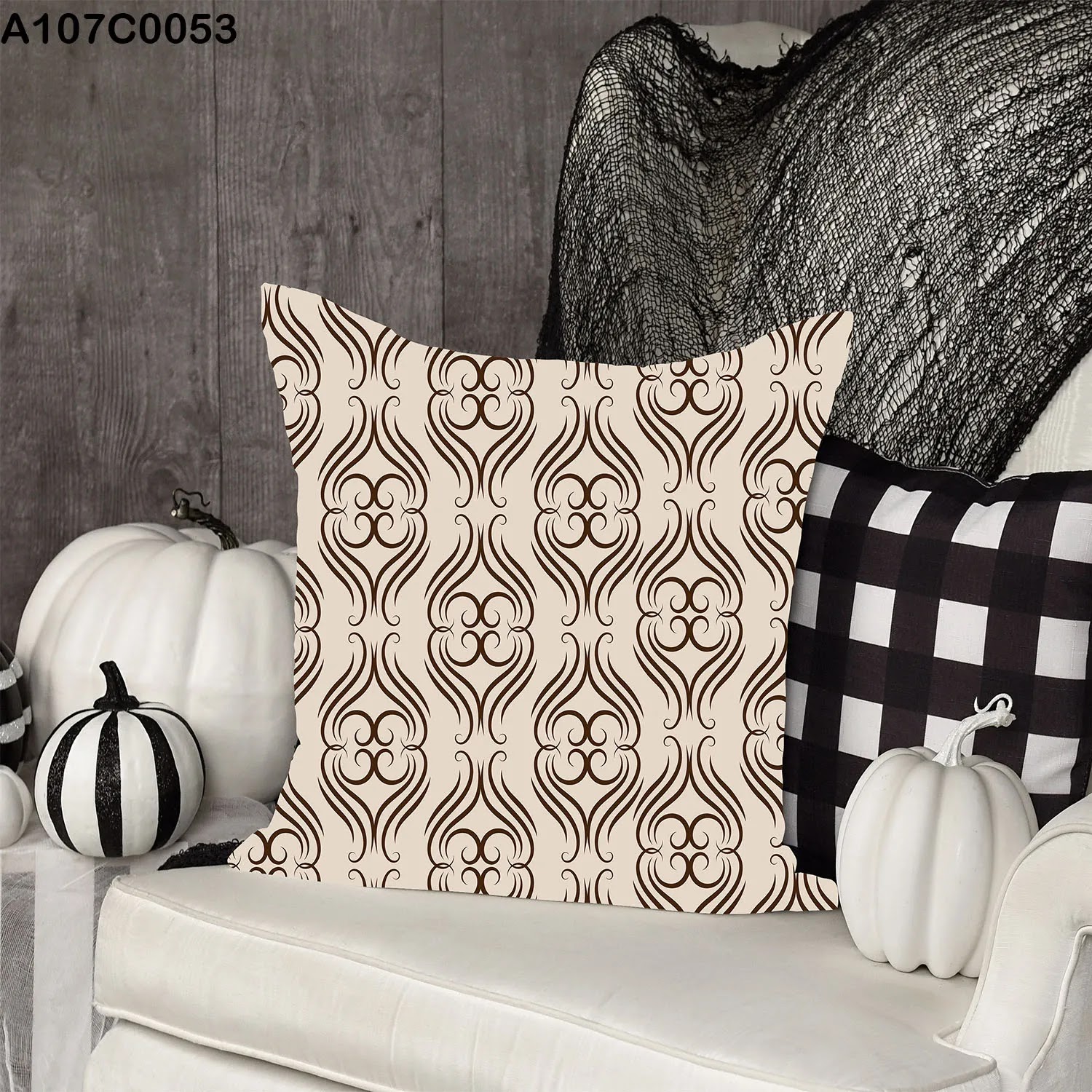 Beige pillow case with brown drawings