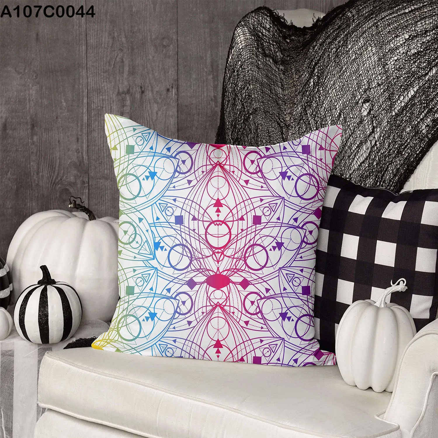 White pillow case with colored drawing shapes