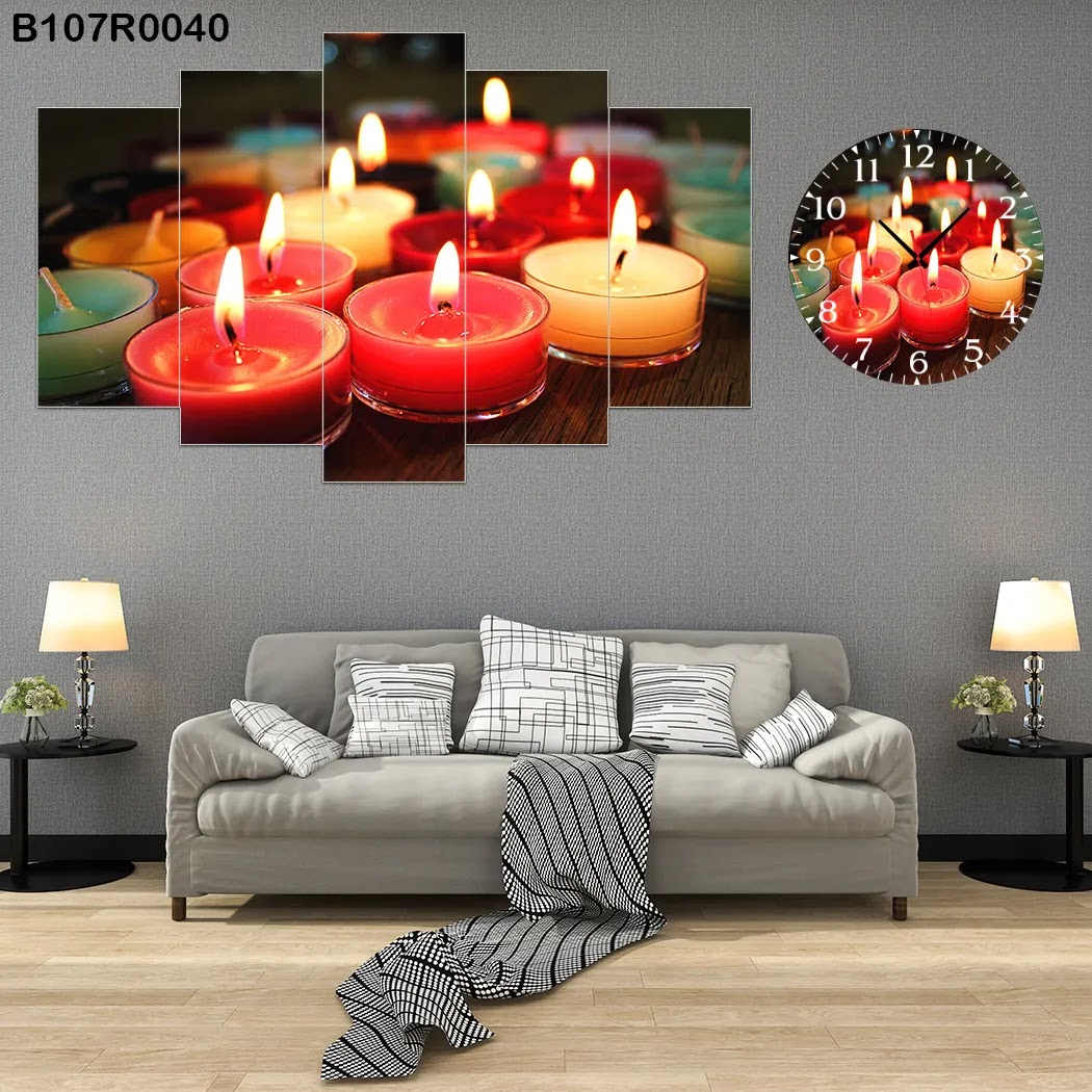 A clock and Wall panel with colored candles