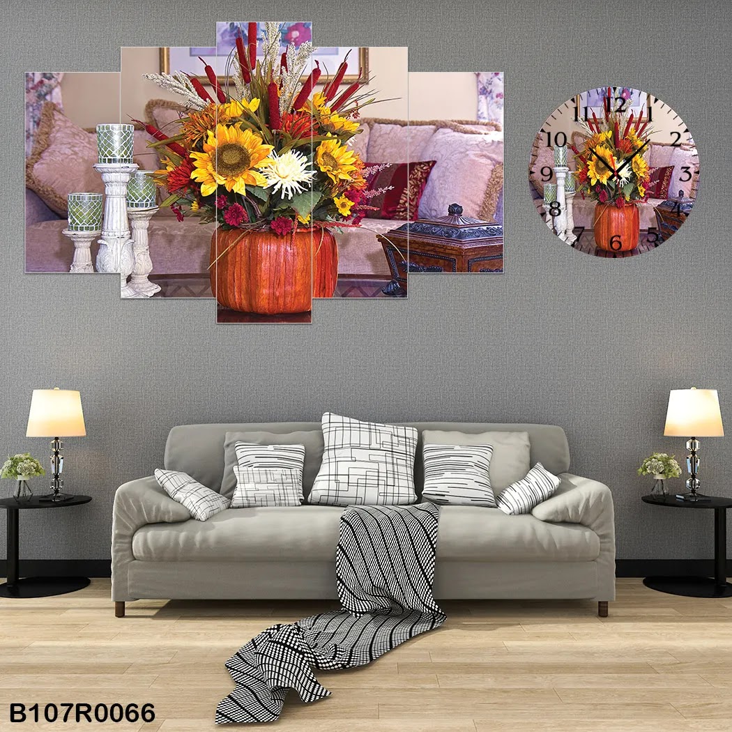 A clock and Picture of a vase with flowers and candles