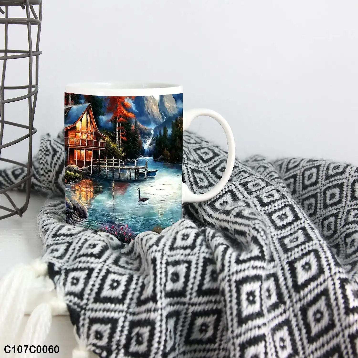 A mug (cup) printed with an image of a cottage in forest