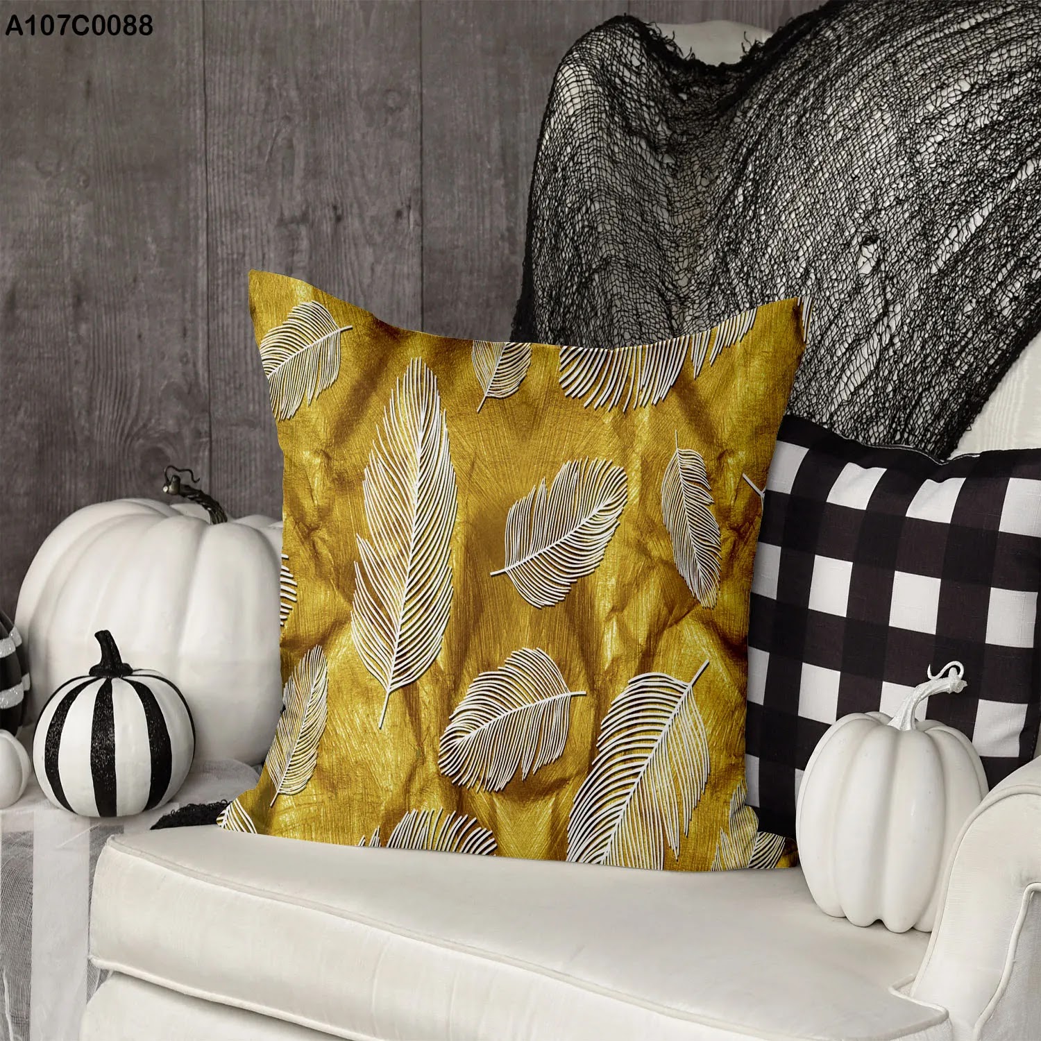 Gold pillow case with gray feather