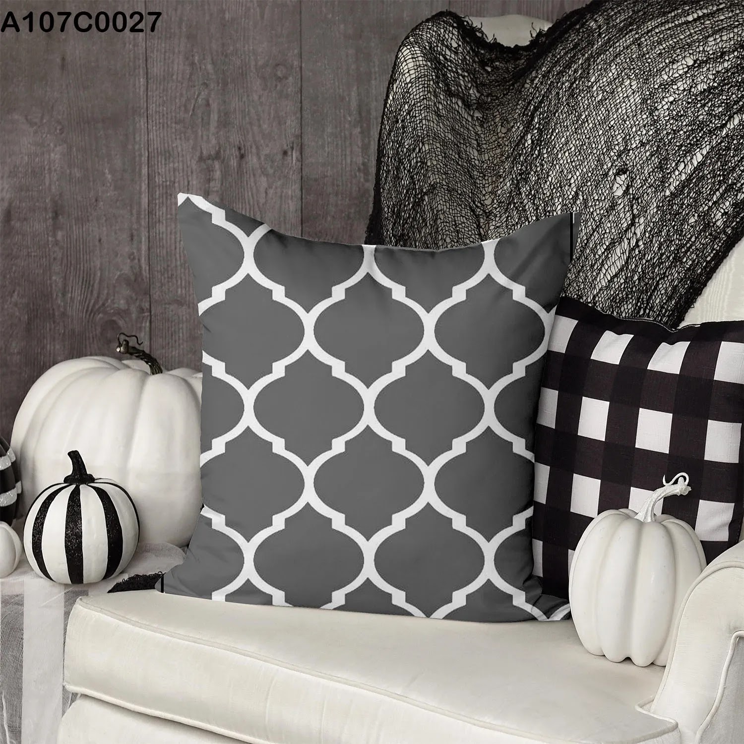 Dark gray pillow case with white lines and shapes