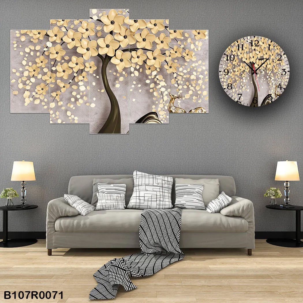 A clock and picture of a tree and white flowers