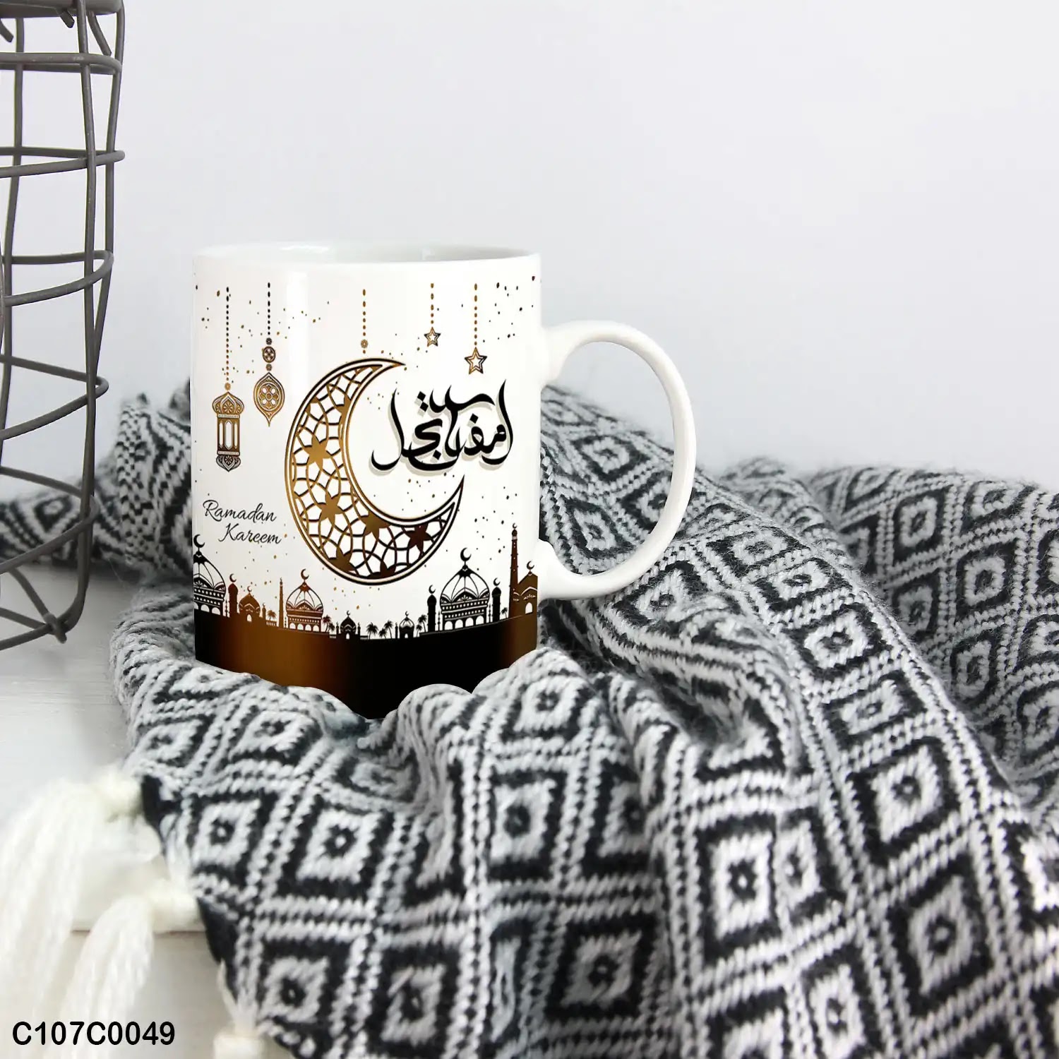 A white and brown mug (cup) printed with "Ramadan Kareem"