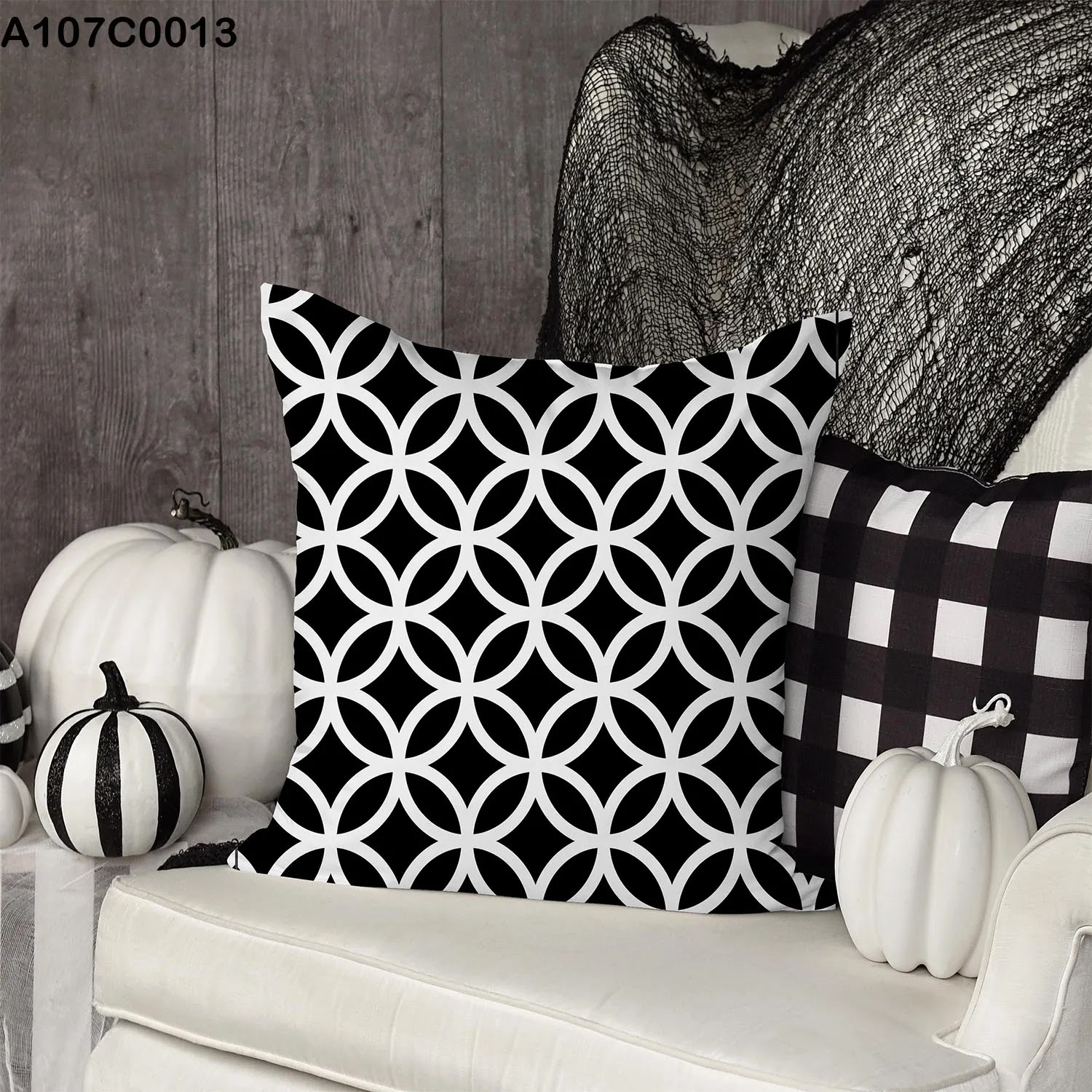 White and black pillow case with circles