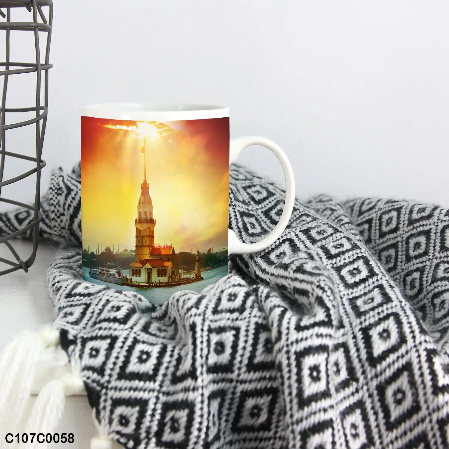 A mug (cup) printed with an image of Maiden tower at sunset
