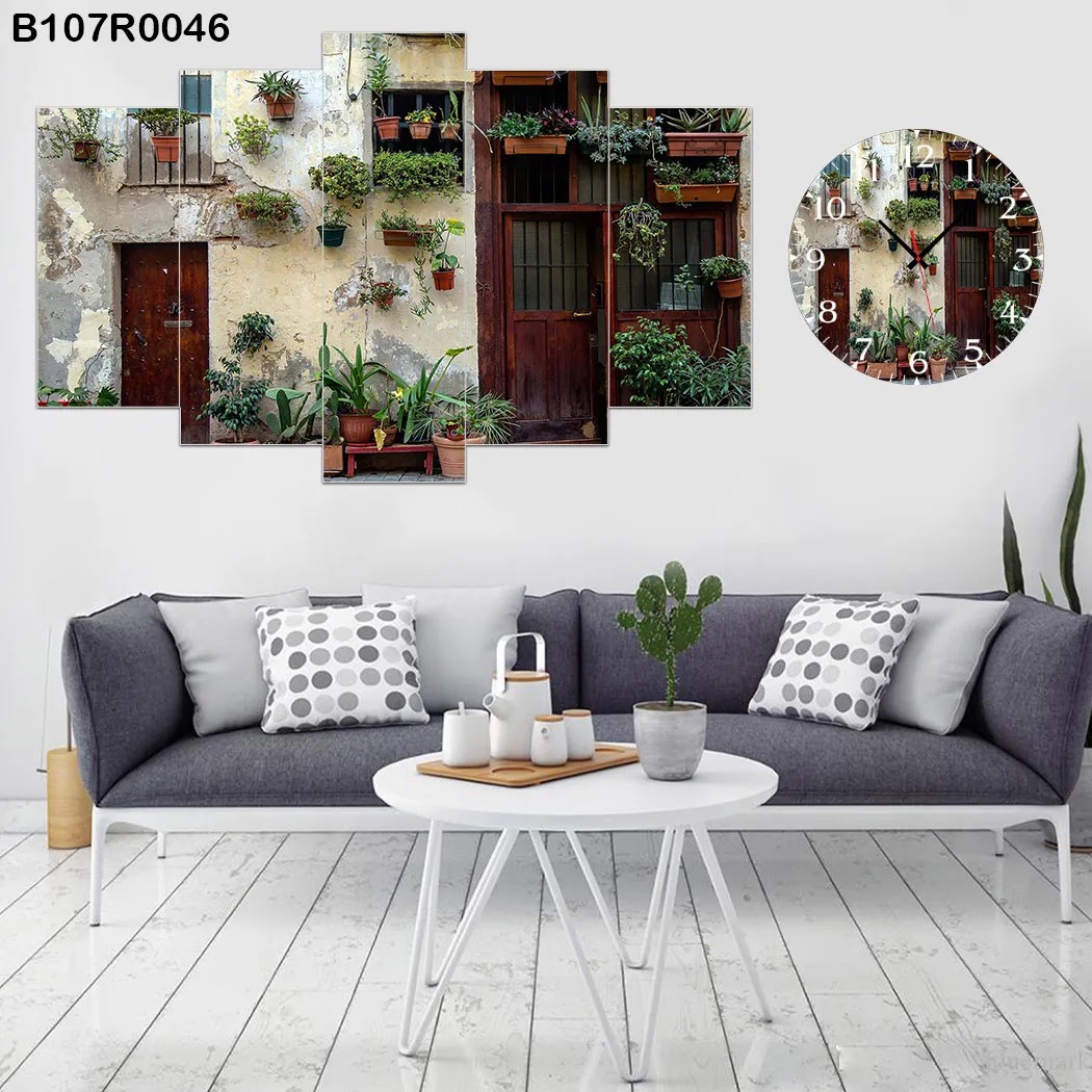 A clock and Wall panel of a house and plants