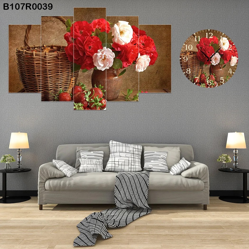 A clock and Picture with white and red roses in basket