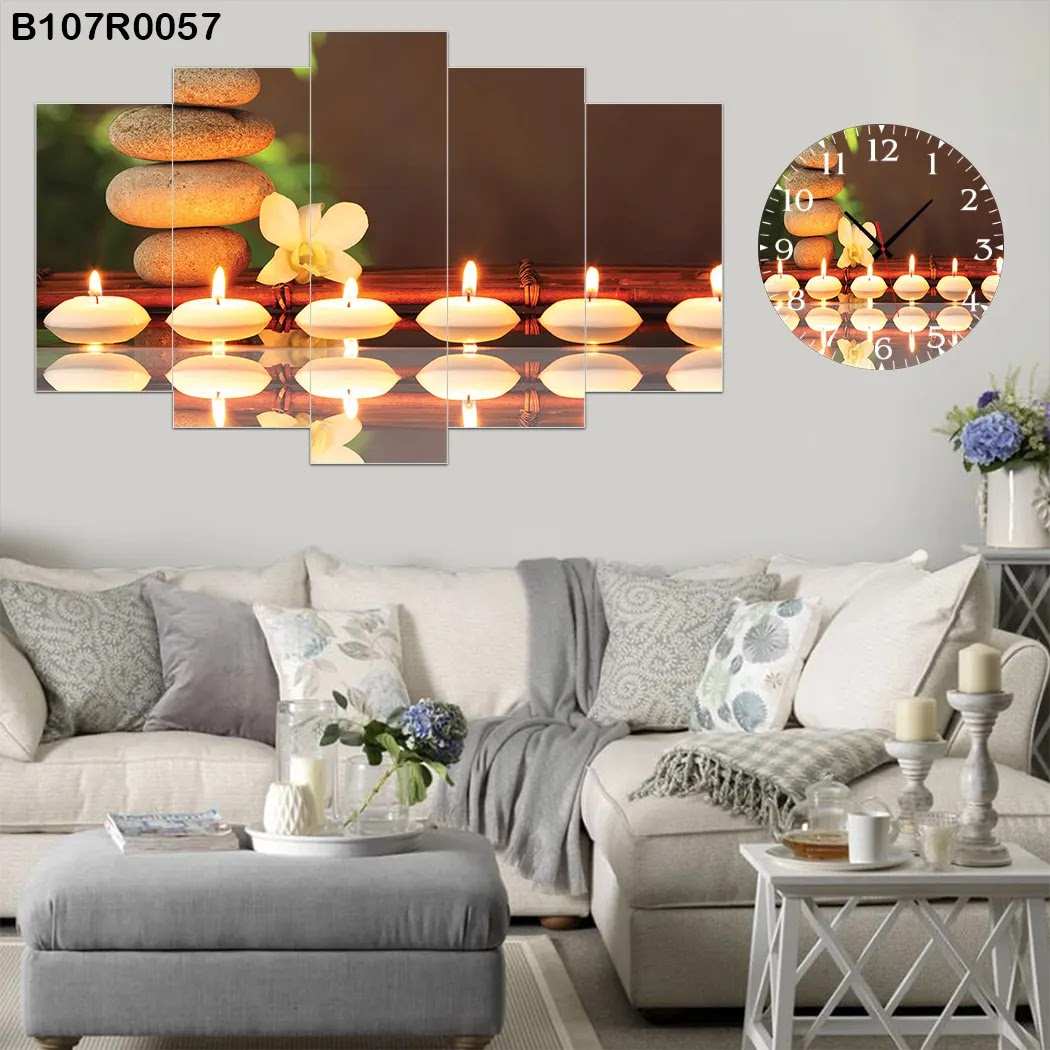 A clock and Large picture of candles