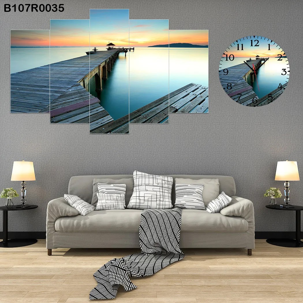 A clock and Wall panel with boardwalk in the sea