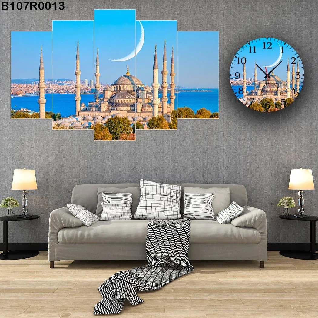 A clock and Wall panel with The blue mosque in Istanbul