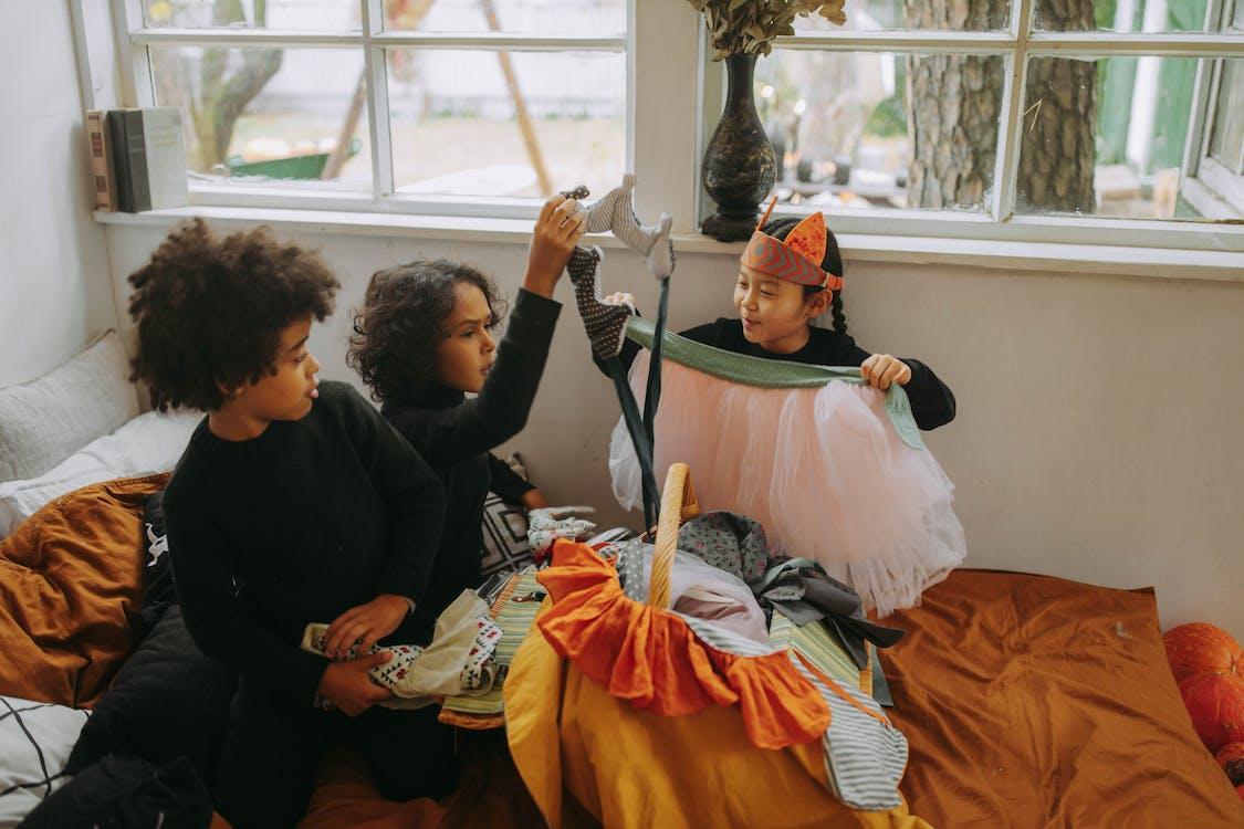 Free 
Children Looking at Costumes Stock Photo