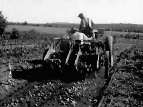 Image result for farmers using machinery 1920