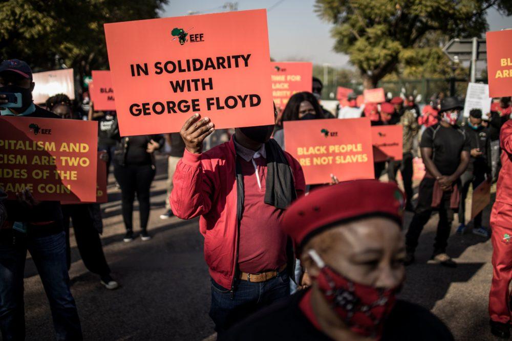 Economic Freedom Fighters gathered in front of the U.S. Embassy in Pretoria, South Africa, in solidarity with the global Black Lives Matter movement on June 8, 2020. (Marco Longari/AFP via Getty Images)