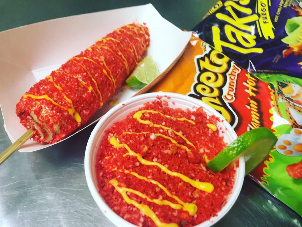 Hot elotes and esquites with hot cheetos.