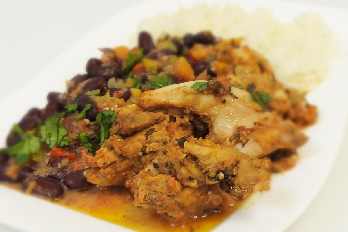 Casa cooks made la bandera, a traditional from our Country of the Month: the Dominican Republic Dish.