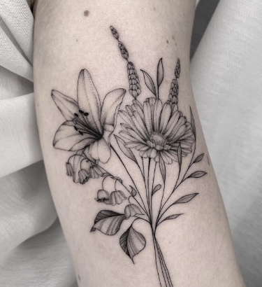 Marigold, Lavender And Lily Of The Valley Tattoo