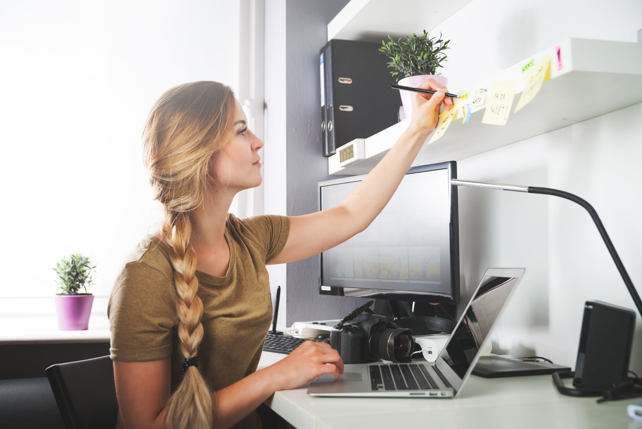  woman working on computer at home office