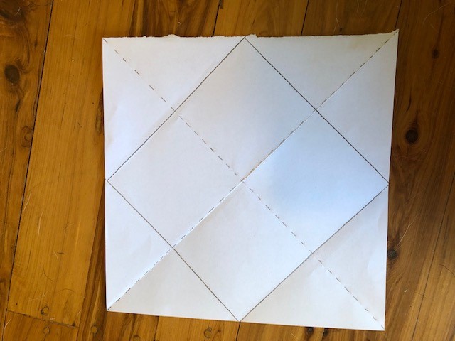 Square unfolded and next square drawn along the folds.