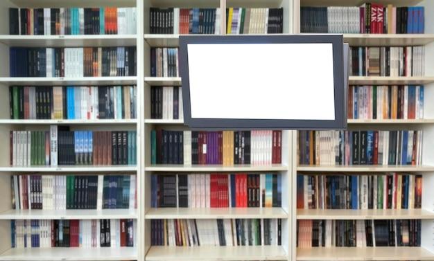 Library digital signage display attached to a bookshelf.