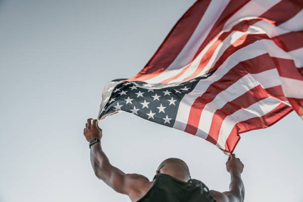 man waving the USA flag