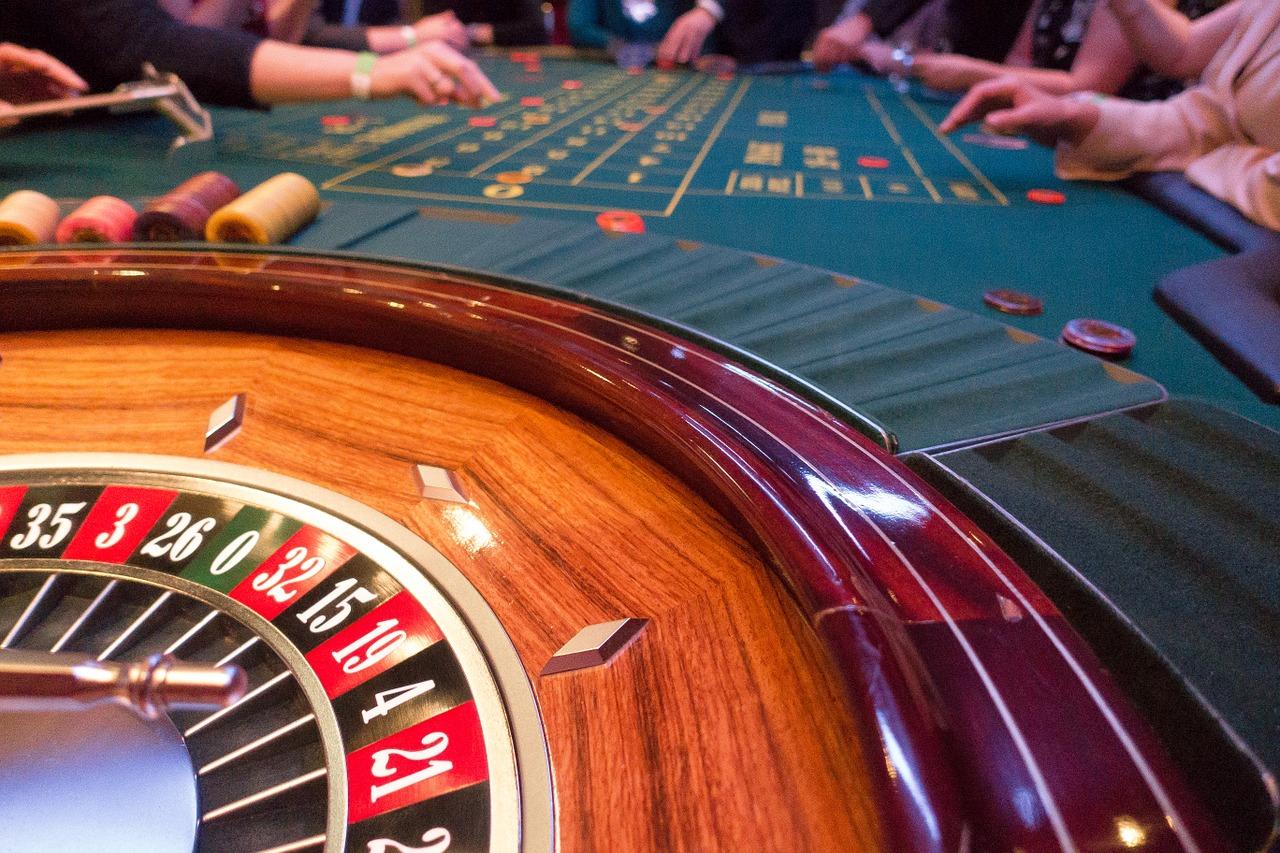 A picture containing roulette, person, indoor, room

Description automatically generated