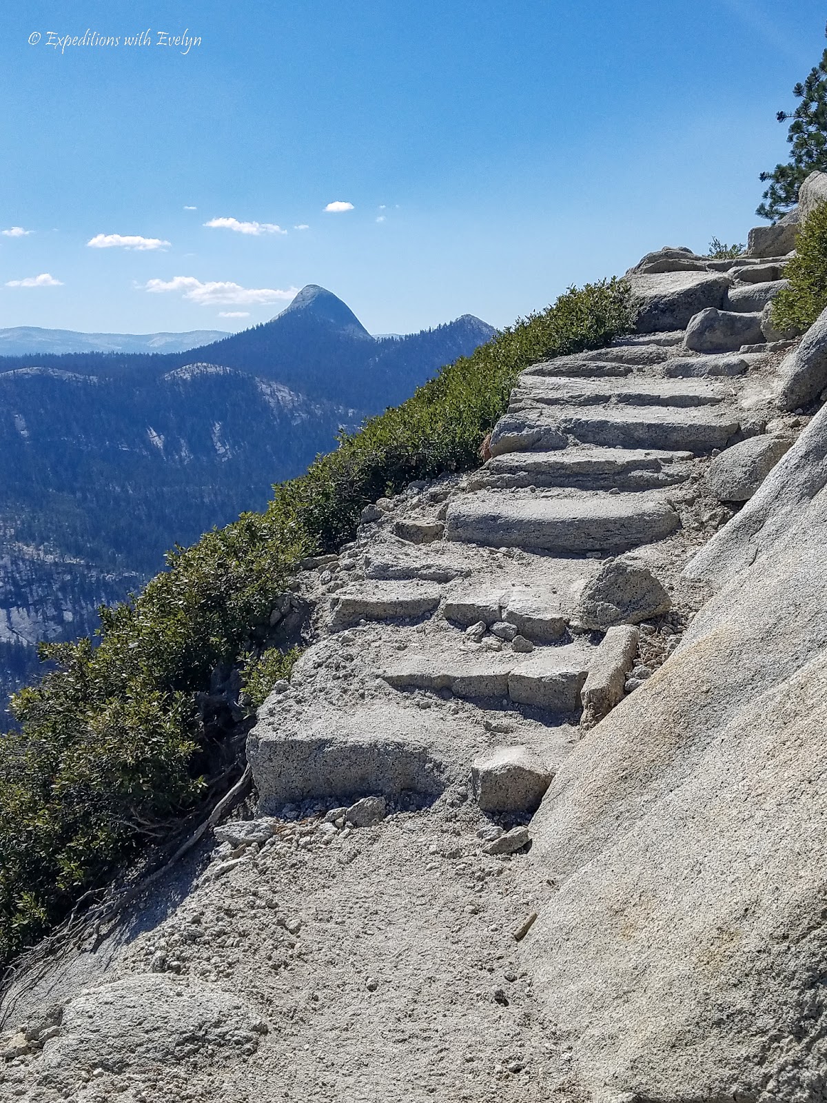 Preparing for lots of stair is one of the most important tips for hiking Half Dome.  The Subdome, shown here, has hundreds built into granite.