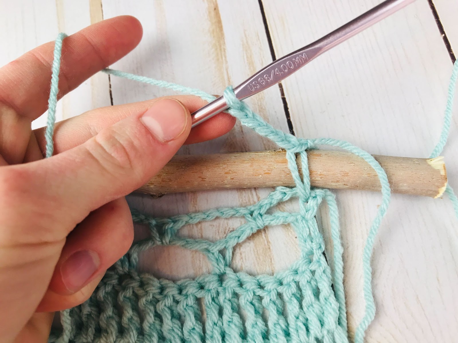 how to attach a crochet wall hanging to a stick