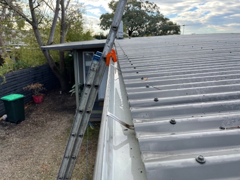 The right ladder should extend ladder 1 metre past the gutter