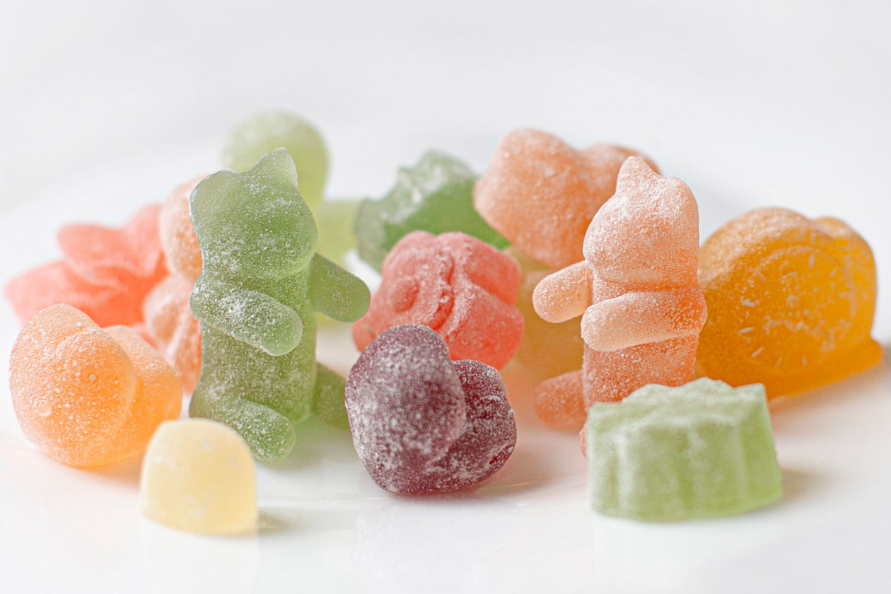 A picture of gummy candies in a variety of colors