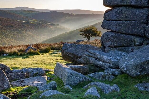 Dartmoor national park surrounded by hills under the sunlight in the morning in the uk