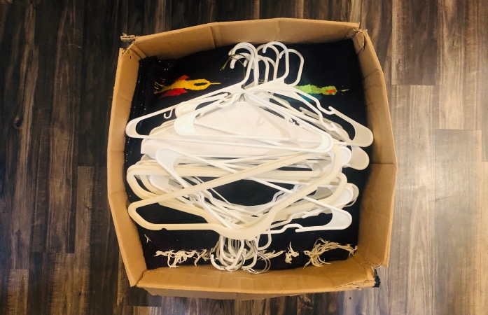 hangers in the top of a moving box
