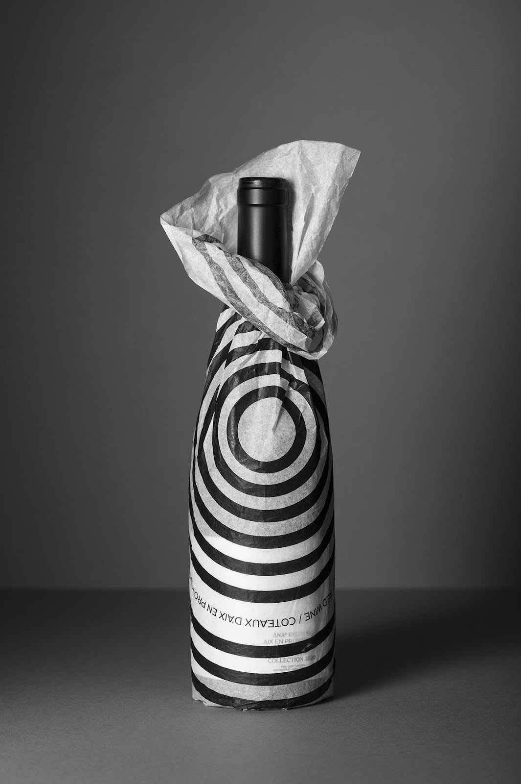 anamorphosis concept glass bottle graphic system mirror Packaging pattern Red wine Silk Paper typography  