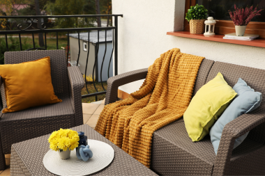 fall colored textiles and blankets Michigan outdoor living space ideas