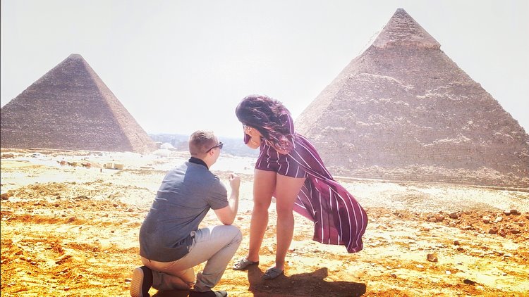 Boy proposing to Girl in front of the pyramids of Giza