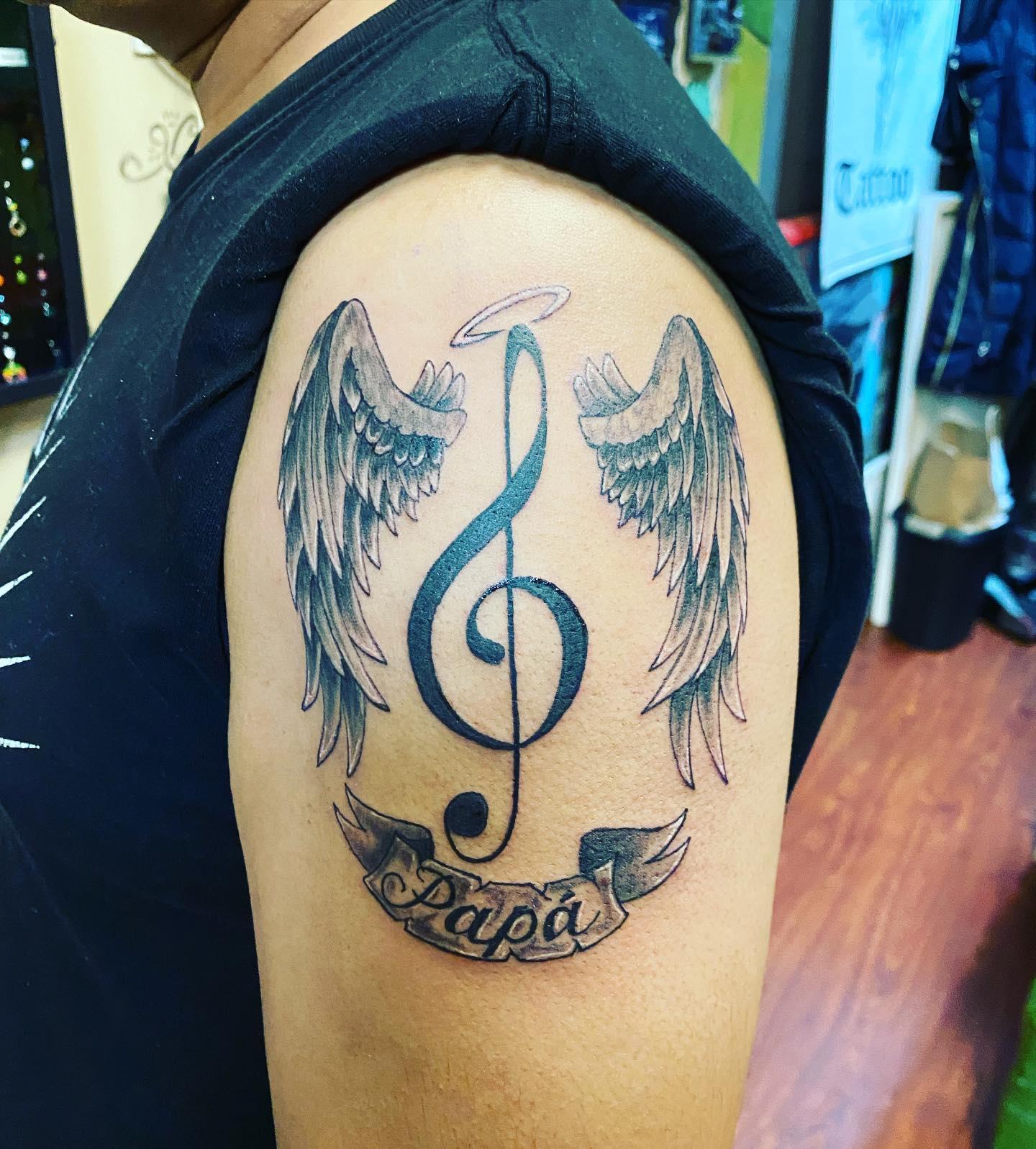 Wings Music Note Tattoo