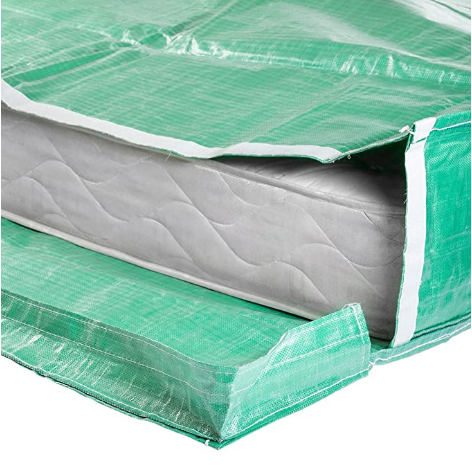 Plastic bags make excellent moisture barriers for storing a crib mattress