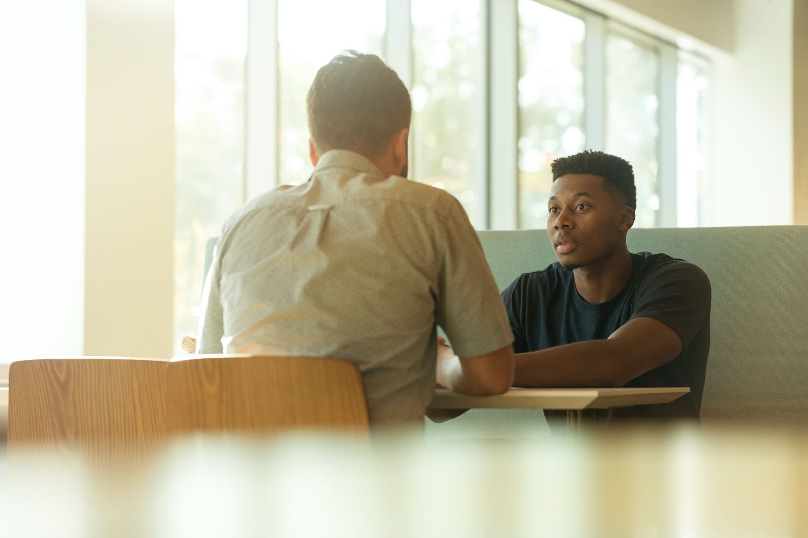 Sitting in a sunny spot with a friend can help lighten the blues and depression.