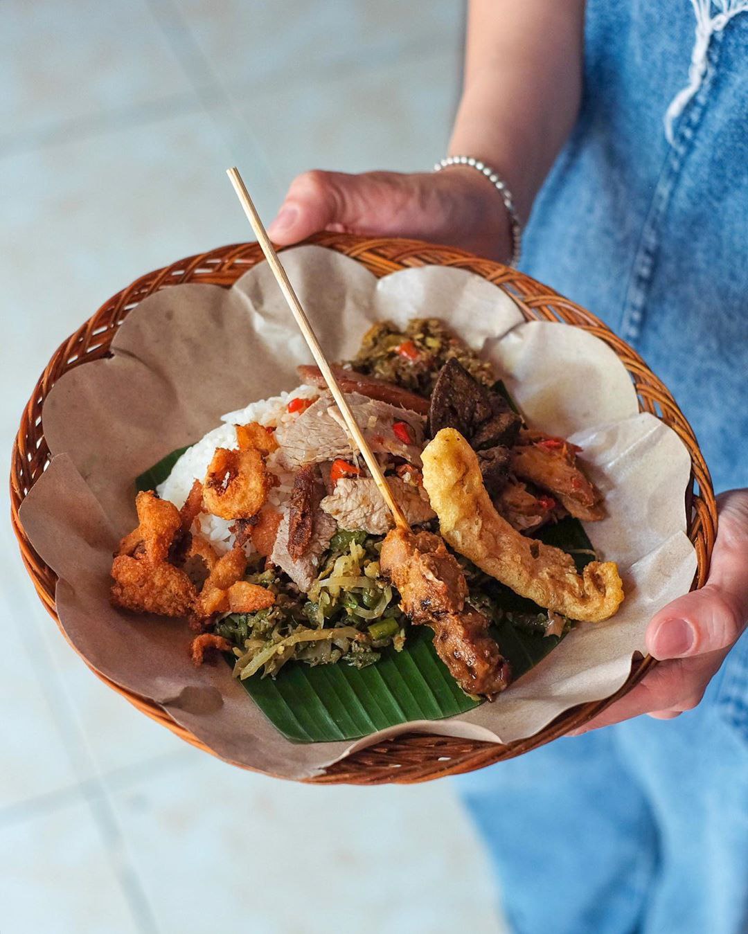 A Bali dish with pork, samba, vegetable 