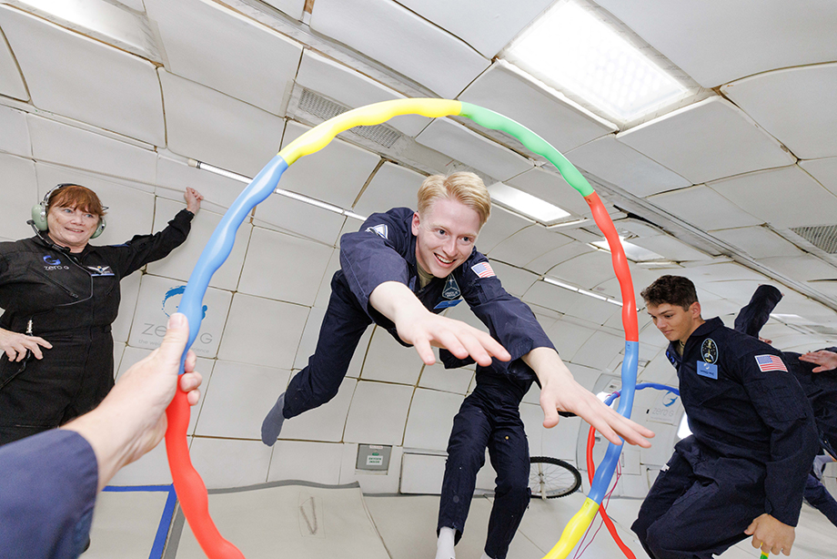 US Space Force cadets take turns to fly through hoops as they master the motions required for movement in zero gravity. Image captured by Miami-based photographer Steve Boxall.